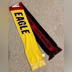 🆕 American Eagle reversible yellow red & black scarf . Unisex one size